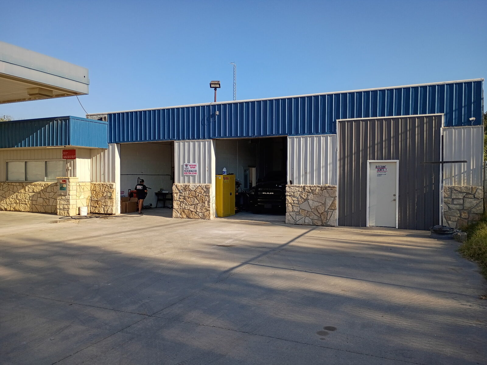 Open service bays at the Discount Dents Emporia shop